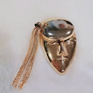 Face Brooch